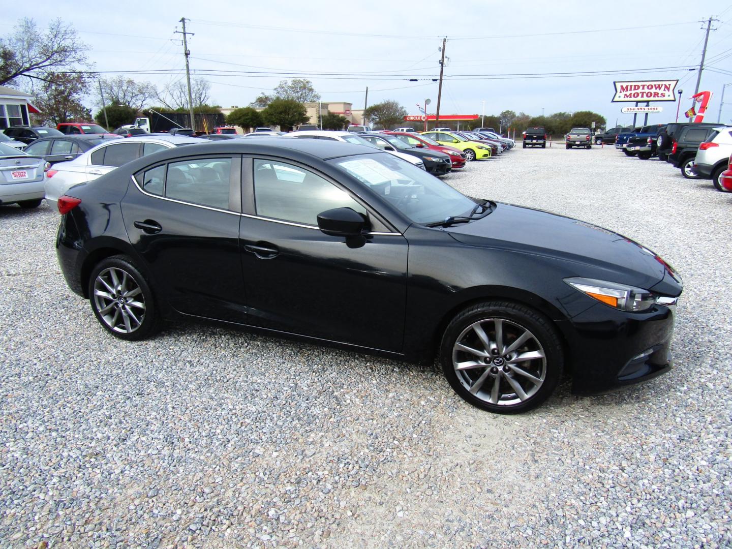 2018 Black /Black Mazda MAZDA3 s Touring AT 4-Door (3MZBN1V30JM) with an 2.5L L4 DOHC 16V engine, Automatic transmission, located at 15016 S Hwy 231, Midland City, AL, 36350, (334) 983-3001, 31.306210, -85.495277 - Photo#0